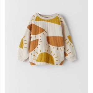 Quilted sun sweatshirt